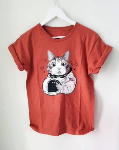 Kaos kucing astronot